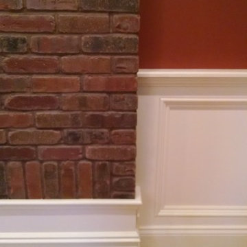 Accent Brick Wall and tastefully done trim.