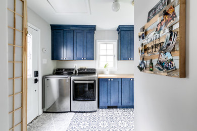 Example of a trendy laundry room design in Richmond