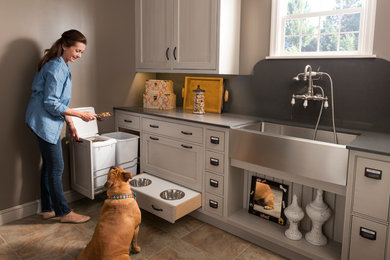 Utility room - large utility room idea in Other with a farmhouse sink, recessed-panel cabinets, white cabinets and gray walls