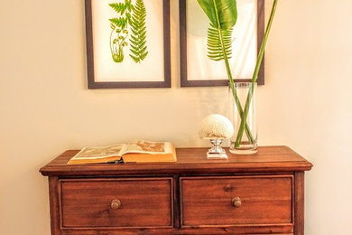 Beach style medium tone wood floor hallway photo in Other with gray walls