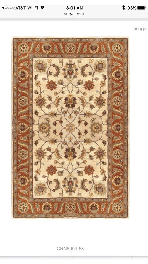 Area rugs in adjacent rooms