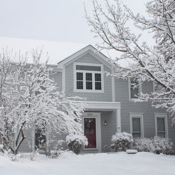 Shingle Siding in Light Mist by James Hardie and White Alside Vinyl Windows