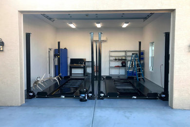 Inspiration for a mid-sized attached two-car garage remodel in Phoenix
