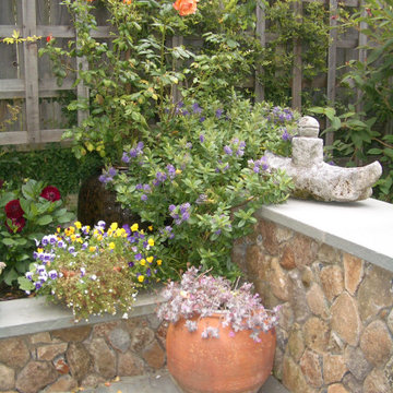 Stone walls framing the patio