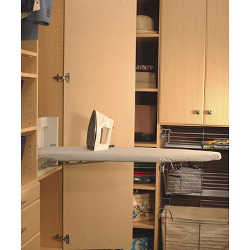 Custom closet with an ironing board and wire storage holders