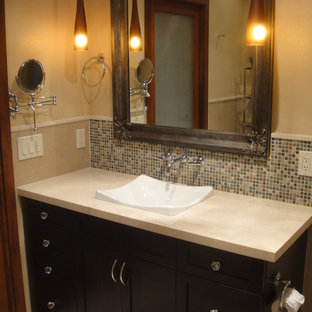 Idées déco pour une petite salle d'eau moderne avec un placard à porte shaker, des portes de placard en bois sombre, une douche à l'italienne, un WC séparé, un carrelage bleu, des carreaux en allumettes, un mur beige, un sol en carrelage de porcelaine, un lavabo posé et un plan de toilette en surface solide.