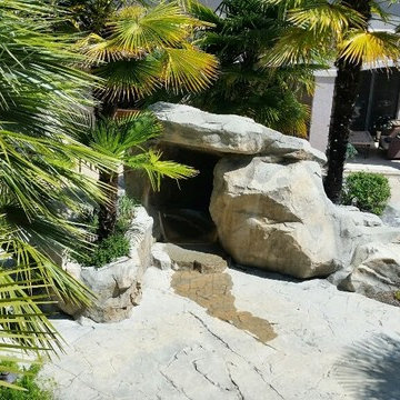 Rock Formation Swimming Pool with Playground