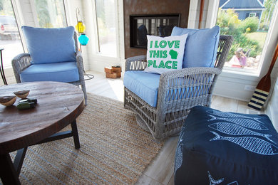 Example of a mid-sized transitional vinyl floor sunroom design in Other with a standard fireplace and a standard ceiling