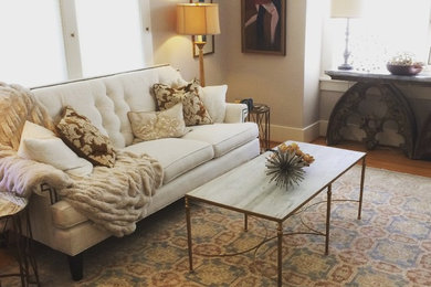 Inspiration for a mid-sized timeless formal and enclosed medium tone wood floor living room remodel in Seattle with beige walls, a standard fireplace, a brick fireplace and no tv