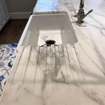 Calacatta Gold Classic Honed Marble Kitchen