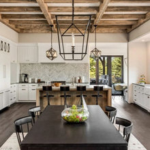black kitchen, corner cabinets, splash of gold