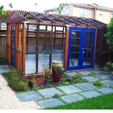 garage conversion to modern greenhouse inspired pergola