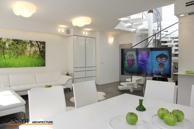 Mid-sized trendy open concept concrete floor living room photo in Tel Aviv with white walls and a tv stand