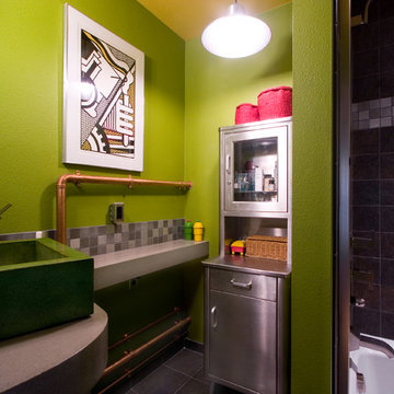 Contemporary, colorful bathroom with exposed plumbing