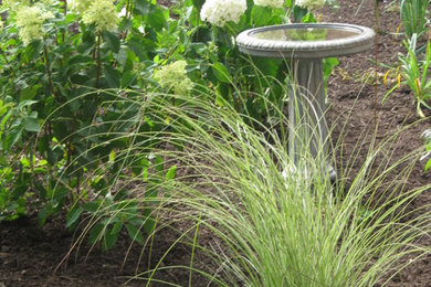 This is an example of a victorian full sun courtyard landscaping in Chicago.