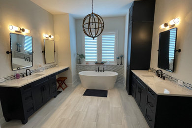 Inspiration for a coastal glass tile porcelain tile, gray floor and double-sink bathroom remodel in Other with shaker cabinets, blue cabinets, brown walls, an undermount sink, white countertops and a built-in vanity