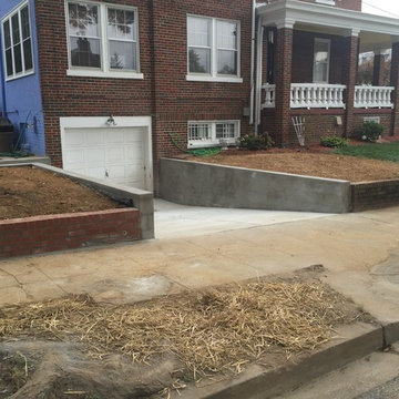 New Concrete Driveway Entrance, Retaining Walls, and New Iron Fence