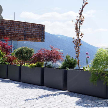 Modern Landscape and Patio Design with Large Modern Garden Planters