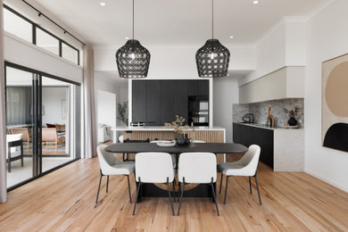 Design ideas for a contemporary dining room in Wollongong.