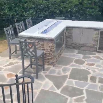 Outdoor Kitchen with Fire Feature & Beer Tap and Flagstone Patio