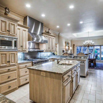 Plano estate with 2 guest houses and tennis court on 1.5 acres