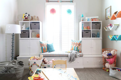 Playroom - transitional carpeted and brown floor playroom idea in Other with beige walls
