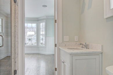 Example of a transitional bathroom design in New York