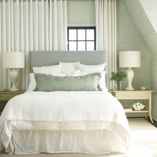 bed in front of window