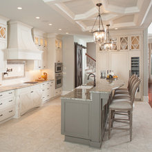 Hardwood floor cream cabinets