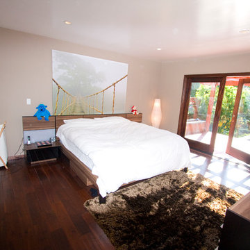 Kids Bedroom With Mural Wall and French Doors to Garden