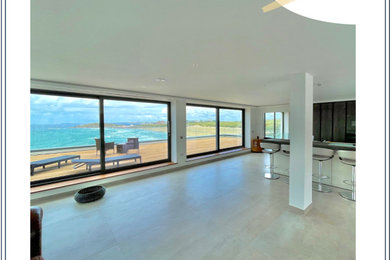 Photo of an expansive beach style home in Cornwall.