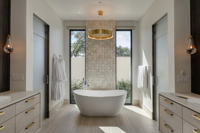 Inspiration for a contemporary master white tile porcelain tile, beige floor and double-sink bathroom remodel in Sacramento with recessed-panel cabinets, light wood cabinets, an undermount sink, a hinged shower door and a floating vanity