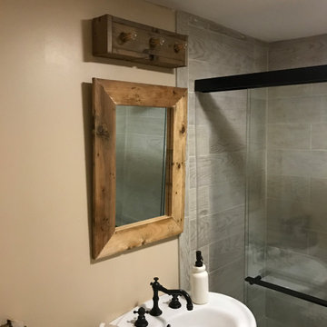 Main Floor Bathroom Sink, Mirror and Light Fixture