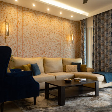 Neutral hued living room with a pop of blue