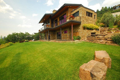 Example of a mountain style exterior home design in Denver