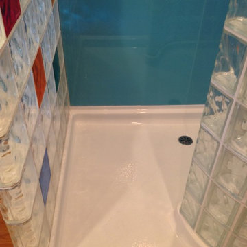 Acrylic shower base for a glass block walk in shower