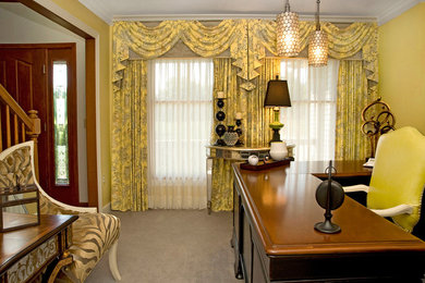 Large elegant freestanding desk carpeted study room photo in Other with yellow walls