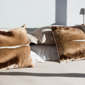 Suite Bed Detail with Brown Cushions