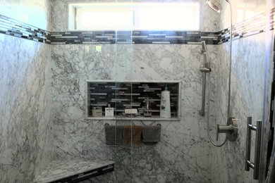 Mid-sized transitional black tile, gray tile, white tile and stone slab alcove shower photo in Orange County