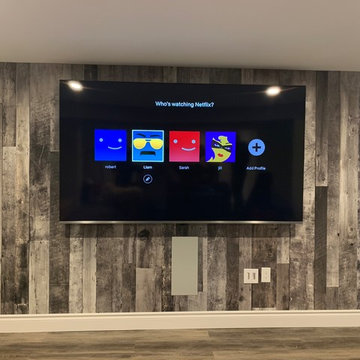 Home Theater with rustic barn board look