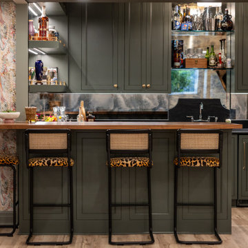 Traditional Basement Remodel with Custom Bar & Entertainment Spaces