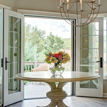 LAMINATE FLOORING EXTENDS INTO COZY DINING AREA
