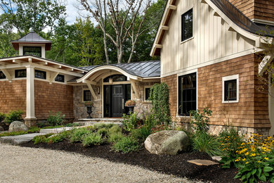 Huge mountain style beige two-story mixed siding exterior home photo in Boston with a hip roof