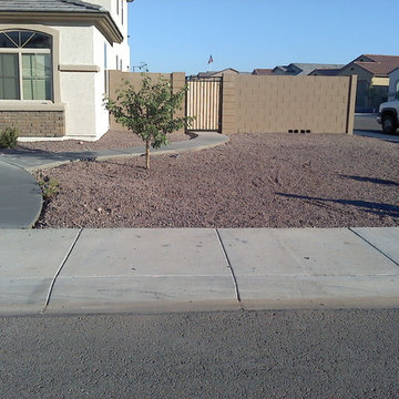 Concrete sidewalk and new gate