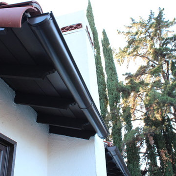 Half Round Rain Gutters with Wrap Around 10 Gauge Twisted Rafter Mount Brackets