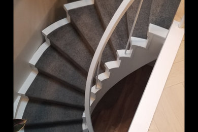 Inspiration for a small eclectic curved staircase remodel in Vancouver