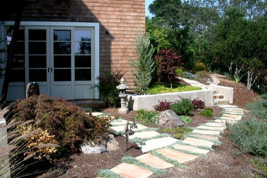 Design ideas for a large contemporary front yard full sun garden in San Francisco with natural stone pavers.