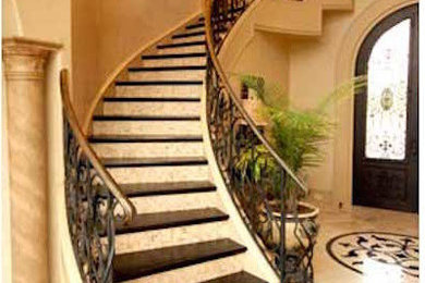 Design ideas for a large traditional wood curved staircase in Dallas.