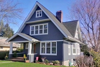 Inspiration for a traditional blue exterior in Seattle with concrete fiberboard siding.