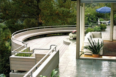 Inspiration for a huge contemporary backyard deck remodel in San Francisco with no cover